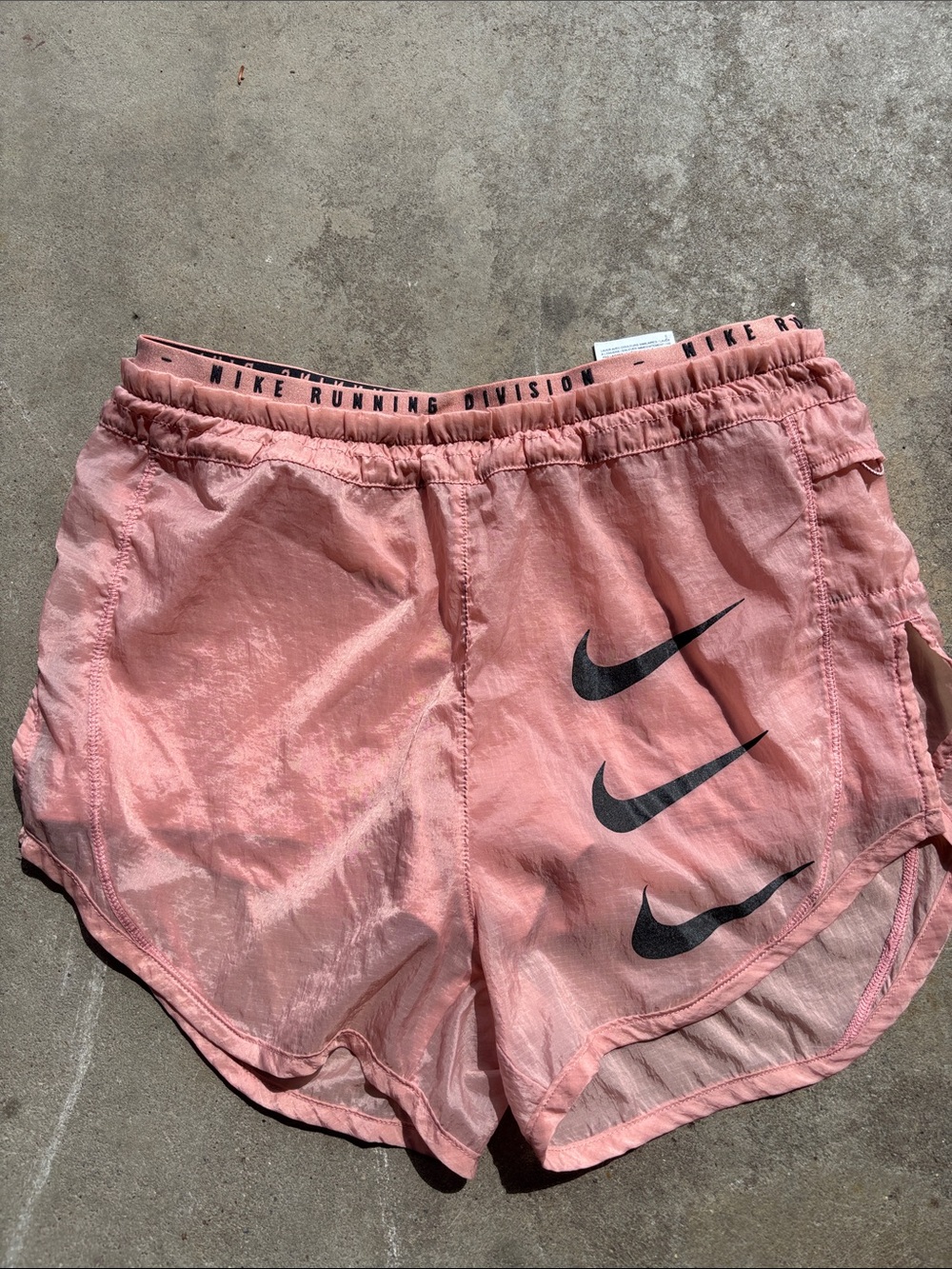Nike Women’s Coral Pink Athletic Running Shorts with Black Swoosh